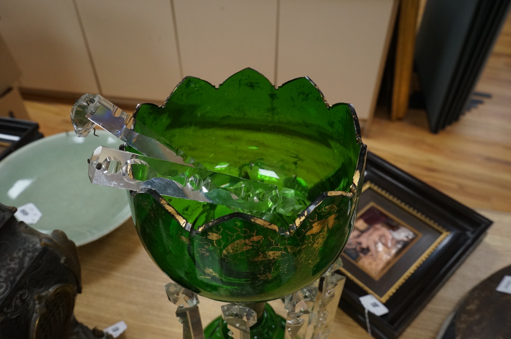 A large Victorian green glass lustre with drops, 45cm high
